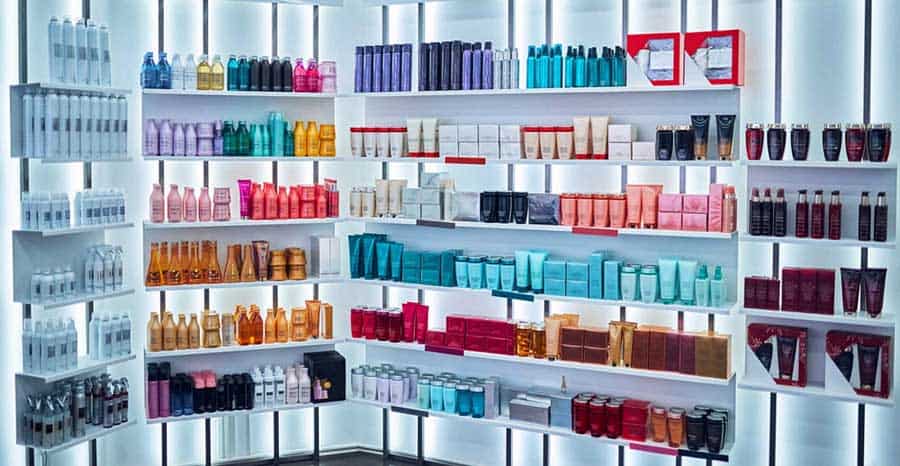 Retail shelves with multi-colored beauty products
